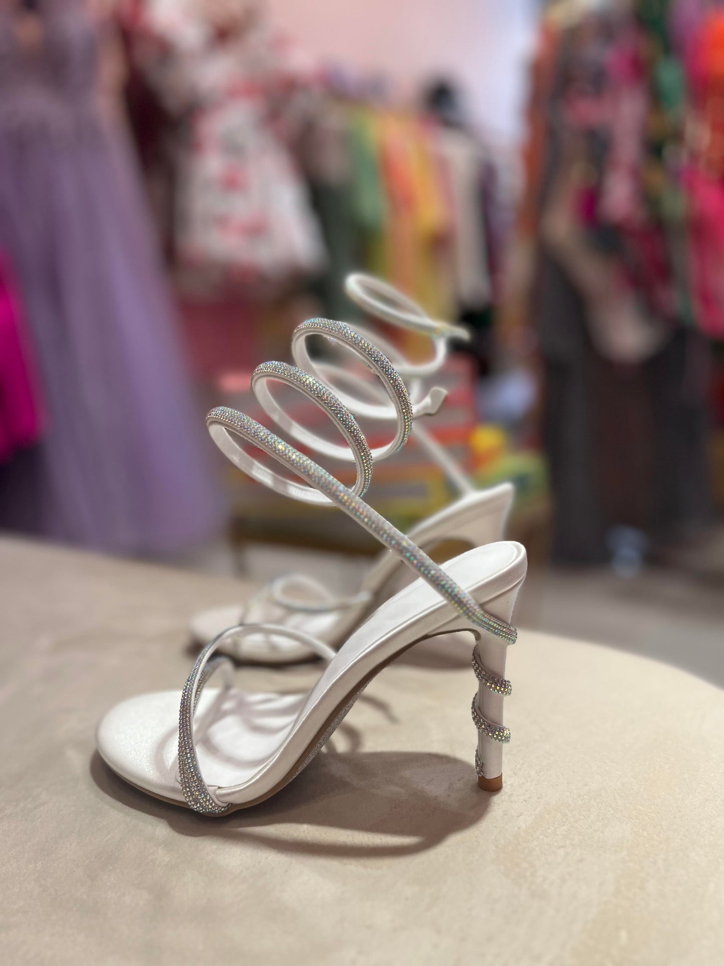 CRYSTAL WHITE TWISTED STRAPY ANKLE HEELS